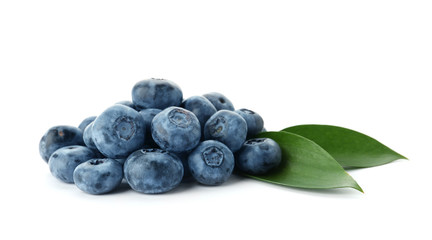 Heap of fresh ripe blueberries on white background