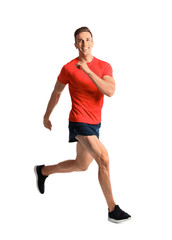 Sporty young man running on white background