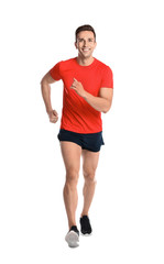 Fototapeta na wymiar Sporty young man running on white background