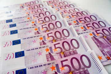 Five hundred euros banknotes in two rows white background