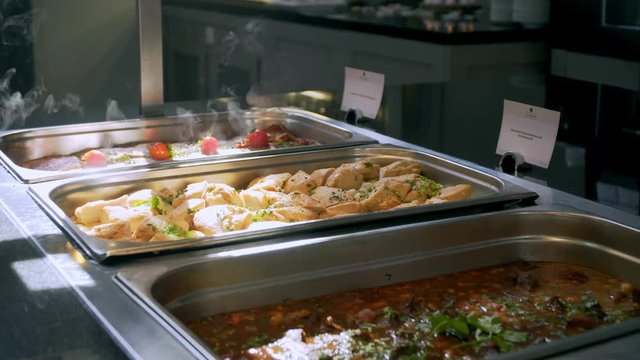 buffet: people take food in plates.