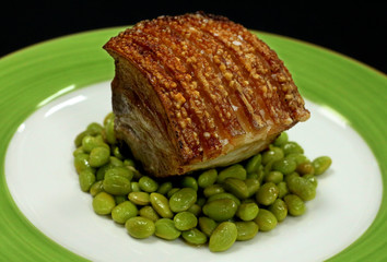pork belly with green soybeans and orange sauce