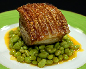 pork belly with green soybeans and orange sauce