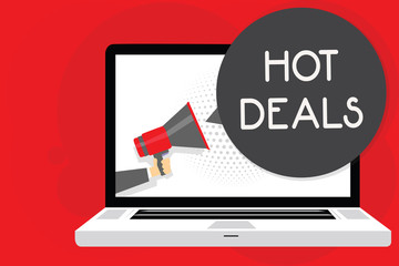 Handwriting text writing Hot Deals. Concept meaning An agreement through which one of the paties is offered and accept Man holding Megaphone loudspeaker computer screen talking speech bubble.