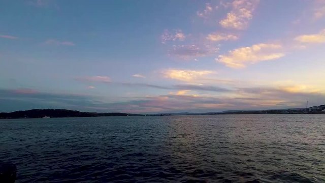 Time lapse of sunset by the water in Oslo, Norway.