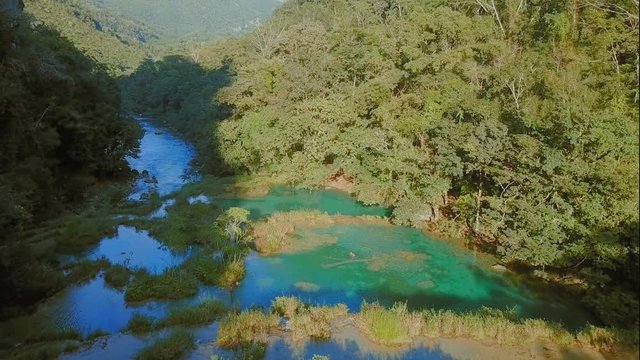 Idyllic waterfall pools in Semuc Champey, Guatemala, AERIAL