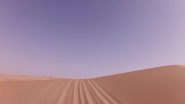 Car trip on the beautiful sand dunes in Rub al Khali desert stock footage video