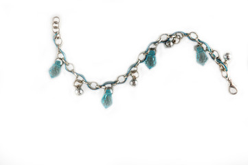 Closeup, necklaces with colored stones, jewelry. Woman.