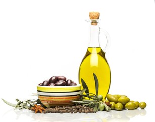 Bottles of Olive Oil with Olives and Spices