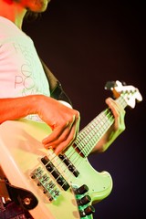 Closeup of a Musician Playing an Electric Bass