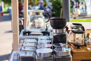 Making puer tea at street cafe's kitchen. Thai asian fast food and drinks. Traditional Chinese tea drink.