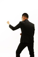 Backside views of Asian business man pulling rope from top Isolated on white backgrounds