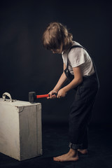 child emotionally posing on camera in the Studio on a white background