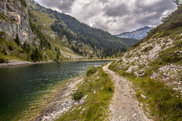 Fototapeta na wymiar Walking trail along Krnsko jezero lake