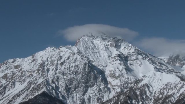 Panorama of Mount Chaberton, 3130 mt. with clouds on the top. Alps, Italy. Winter. Static