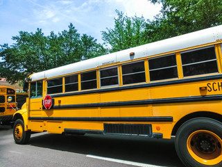 Naklejka na ściany i meble The traditional school buss on freeway road at Orlando, Florida, USA