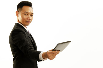 Smart business man hand holding tablet and giving forward on white backgrounds. Place for you text