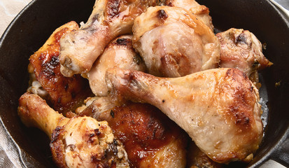 Fried chicken legs in pan