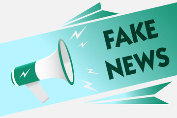 Conceptual hand writing showing Fake News. Business photo showcasing Giving information to people that is not true by the media Megaphone loudspeaker speech bubble message speaking loud.