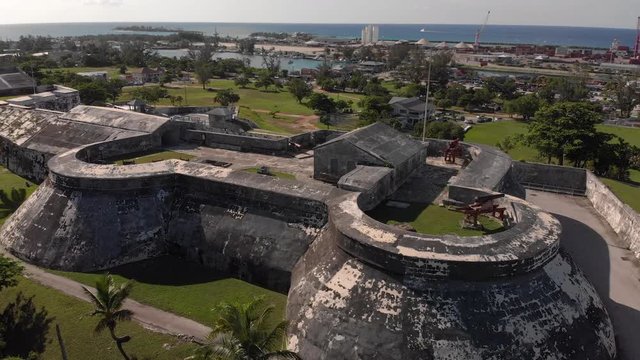 4K Cinematic Aerial Flythrough over the top of the historical Fort Charlotte in Nassau Bahamas.