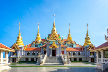 A scenic view of the Buddhist temples in Thailand at sunset. Ancient, Buddhism. Oriental architecture. Thailand landmark.