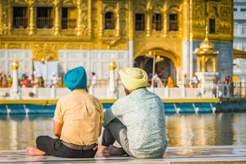 Sikh devotees in front of the Golden temple in Amritsar, India