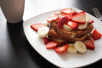 Healty french toast breakfast with strawberries