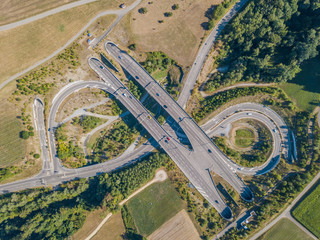 Aerial view of highway bridge and tunnel entrance in Switzerland, Europe