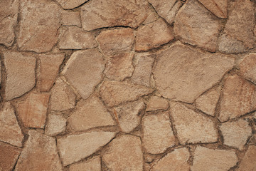 weathered wall or old road made of stone