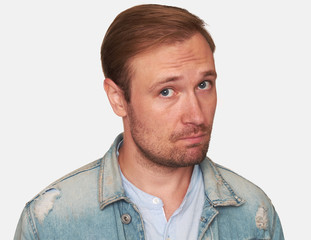 Obraz premium Portrait of casual handsome man in denim jacket