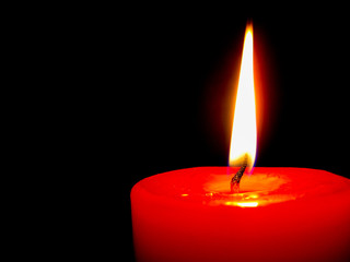 candle flame in dark background.