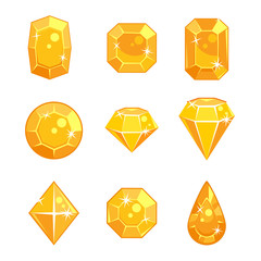 Cartoon vector yellow gem stones in different shapes