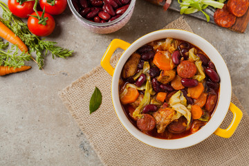 Traditional portuguese goulash with cabbage, beans and ribs.