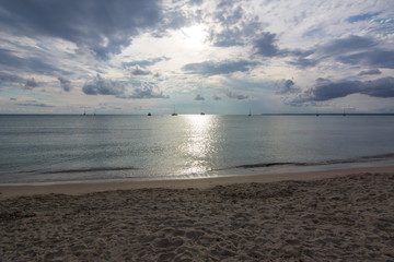 Obraz premium Yachts at sunset on Es Trenc beach (playa), south Mallorca, Spain