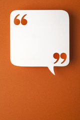 speech bubble on orange background