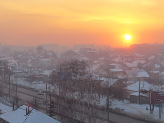 winter sunset over the city