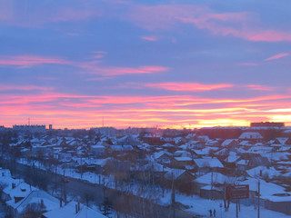 winter sunset over the city