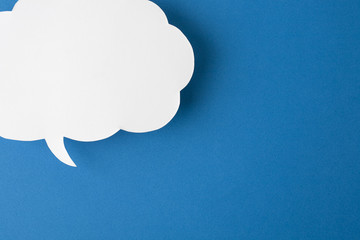 speech bubble on blue background