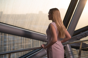 girl stands in the corridor 