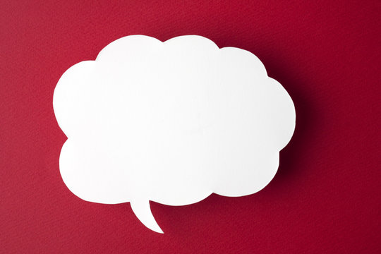 speech bubble on red background