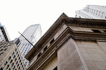 Naklejka premium Low angle view of buildings against sky in Downtown of Manhatta