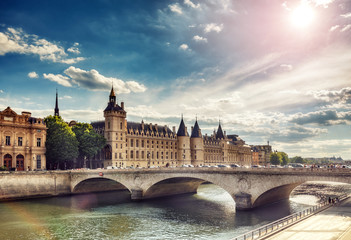 Beautiful skyline of Paris, France, with Conciergerie, Pont Neuf at sunset. Colourful travel background. Romantic cityscape. - 218174253