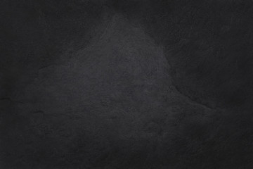 Fototapeta premium Dark grey black slate texture in natural pattern with high resolution for background and design art work. Black stone wall.