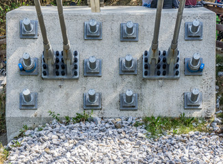 Anchorages and dowels in the rock for fixing the steel cables of a suspension bridge