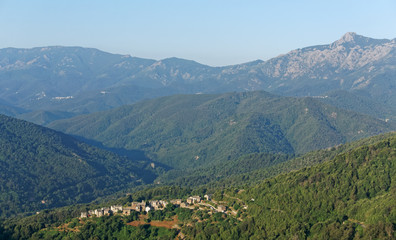 Fototapeta na wymiar Porri di Casinca and San Petrone mountain in Corsica