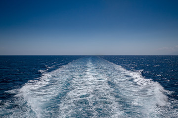 Wake left by ship in transit, on the open sea