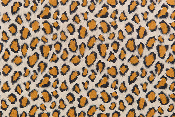 Closeup leopard pattern cotton knitted textile as background