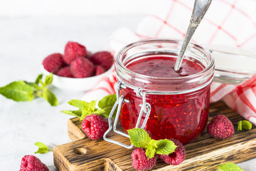 Strawberry jam in glass jar.