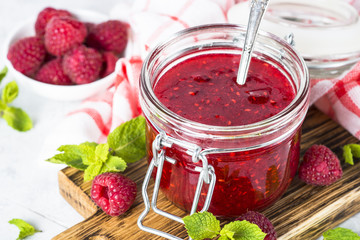 Strawberry jam in glass jar.