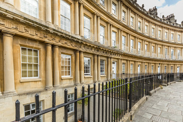 General view of the Georgian houses at the Circus in the Unesco World Heritage city of Bath, Somerset,  UK - Powered by Adobe